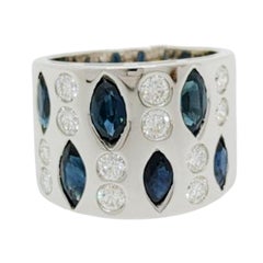Marquise Shape Blue Sapphire & Round Diamond Ring in 18K White Gold