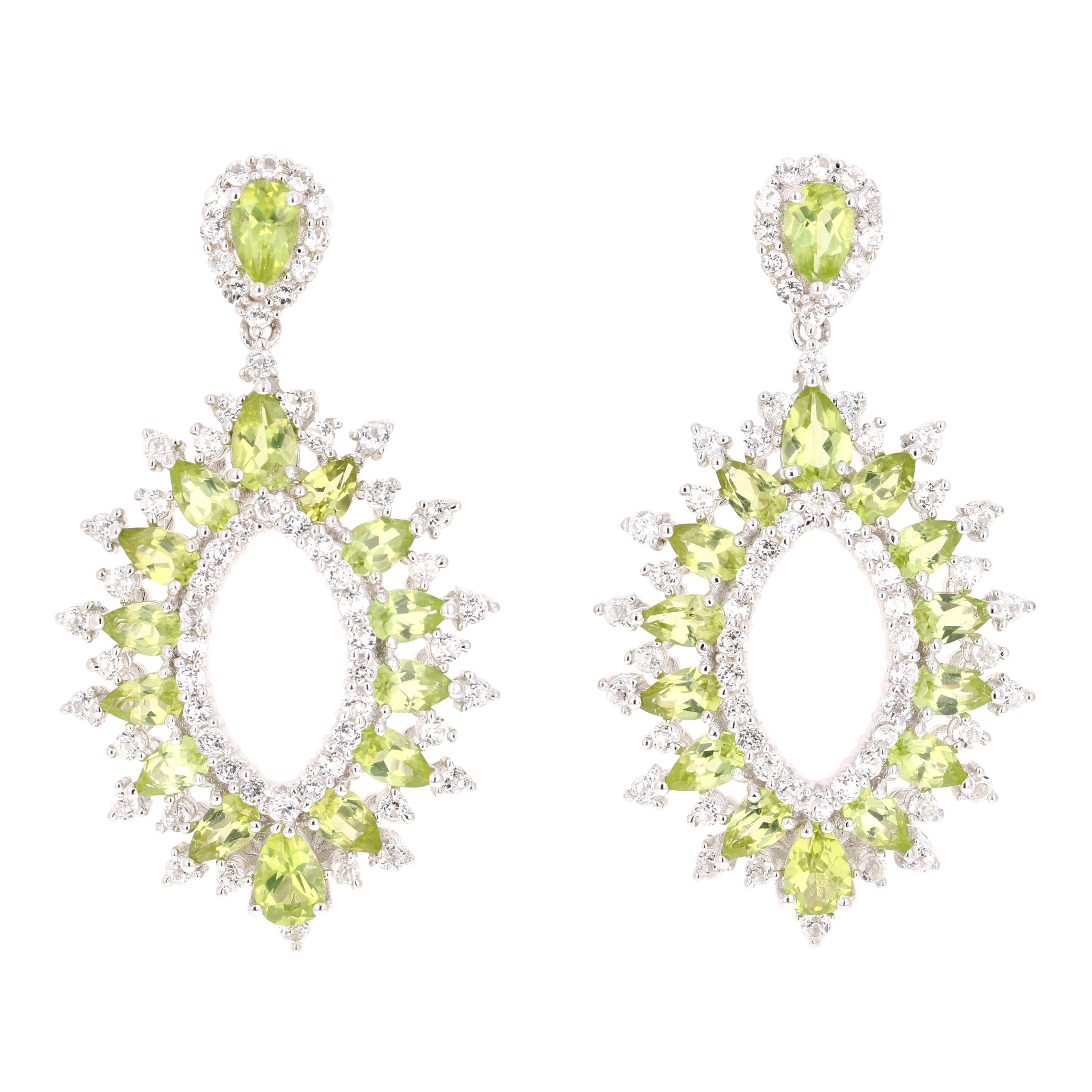 Ohrringe aus Silber mit 6.25 Karat Peridot und weißem Topas im Angebot