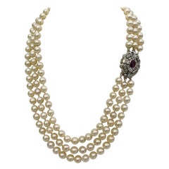 Collar de perlas, rubíes y diamantes en oro blanco