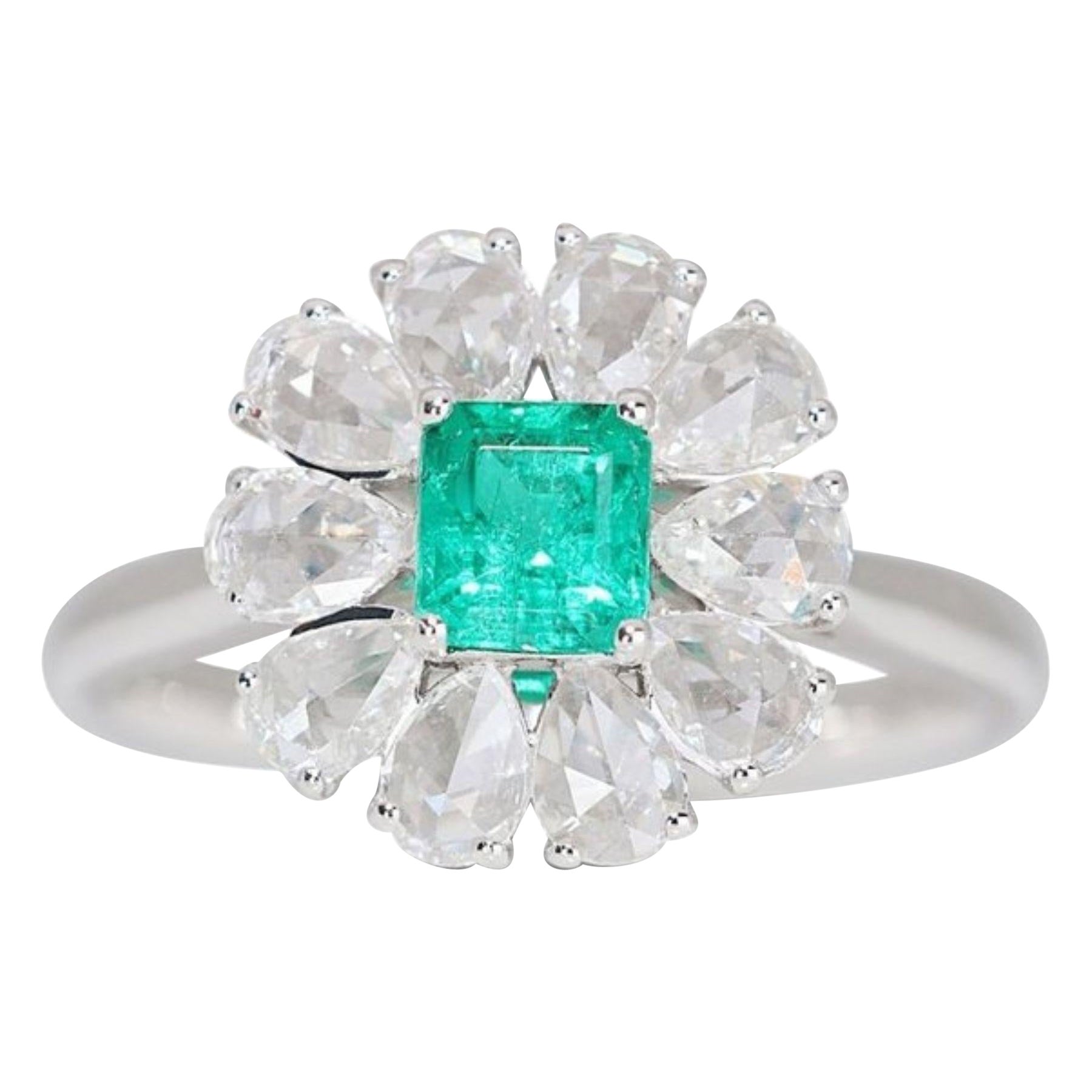 Magnificent 18K White Gold Emerald Flower Ring For Sale