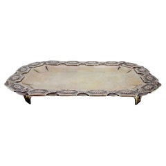 Rectangular silver tray w/ floral edge reliefs on 4 openwork feet