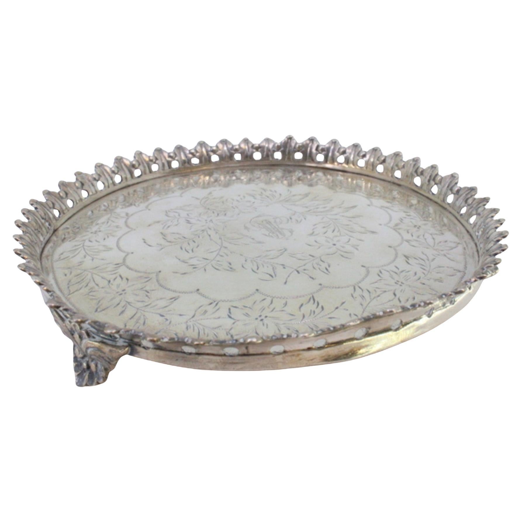 Silver tray w/ wire rack 
floral engravings on 3 raised feet