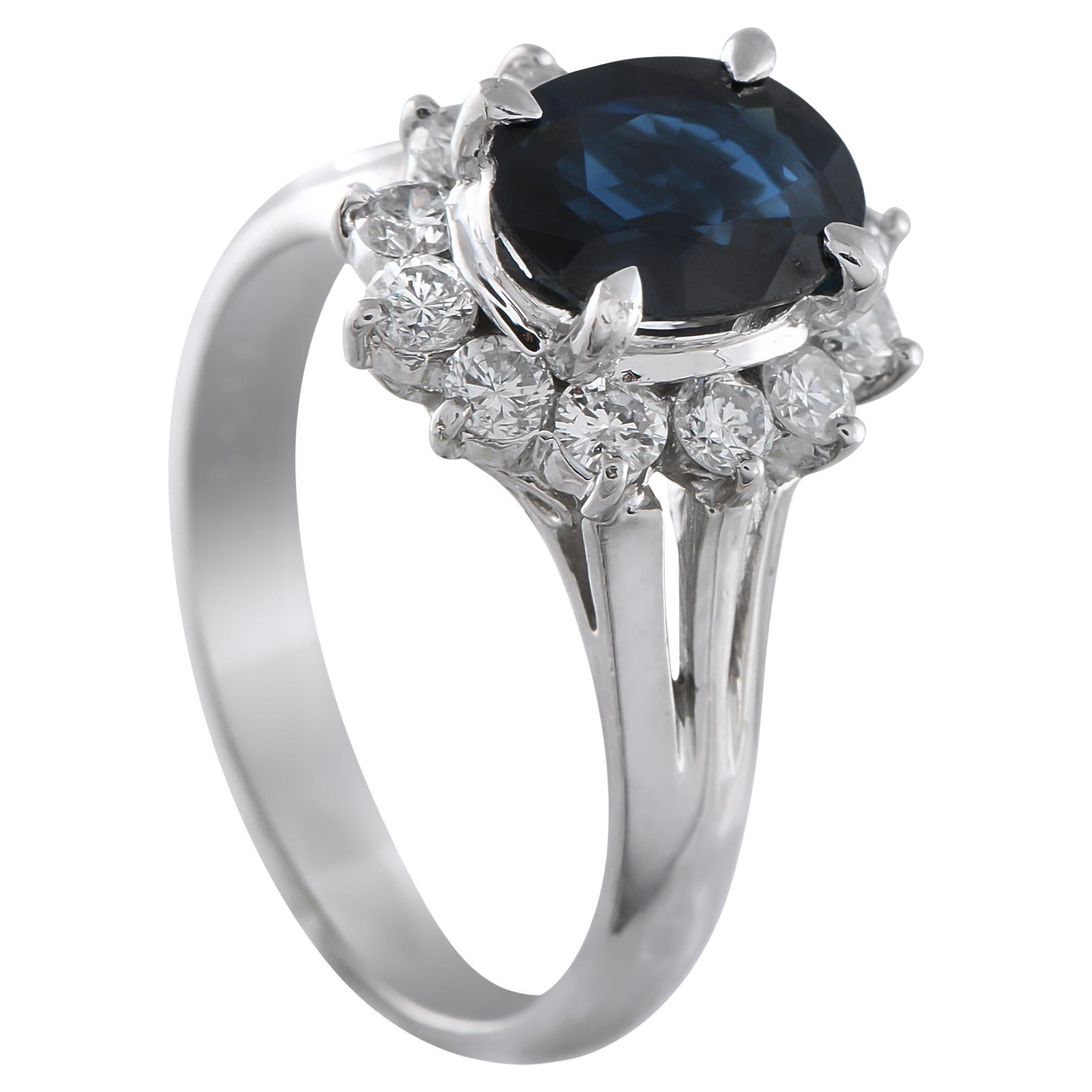 Anello in platino con diamante e zaffiro da 0,48 carati in vendita
