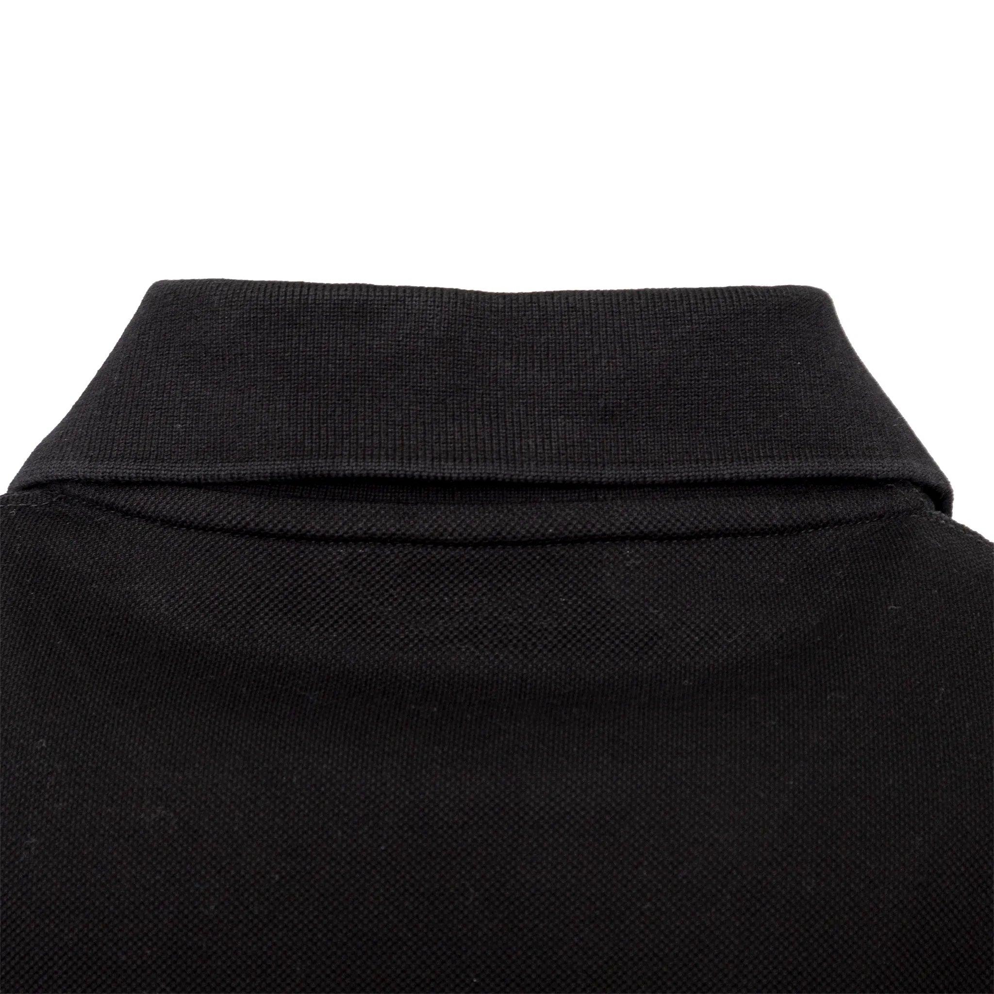 Polo classica nera di Saint Laurent in cotone, con maniche corte e logo YSL ricamato sul petto.  
 Misure: Spalla:42;Manica:18;Busto:52;Lunghezza:65  
 Materiale: 100% cotone
