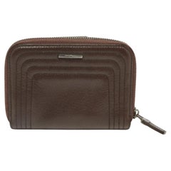 Portafoglio compatto con zip in pelle marrone scuro di Salvatore Ferragamo