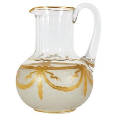 Brocca in cristallo di Baccarat francese, con motivo a festoni dorati, XX secolo