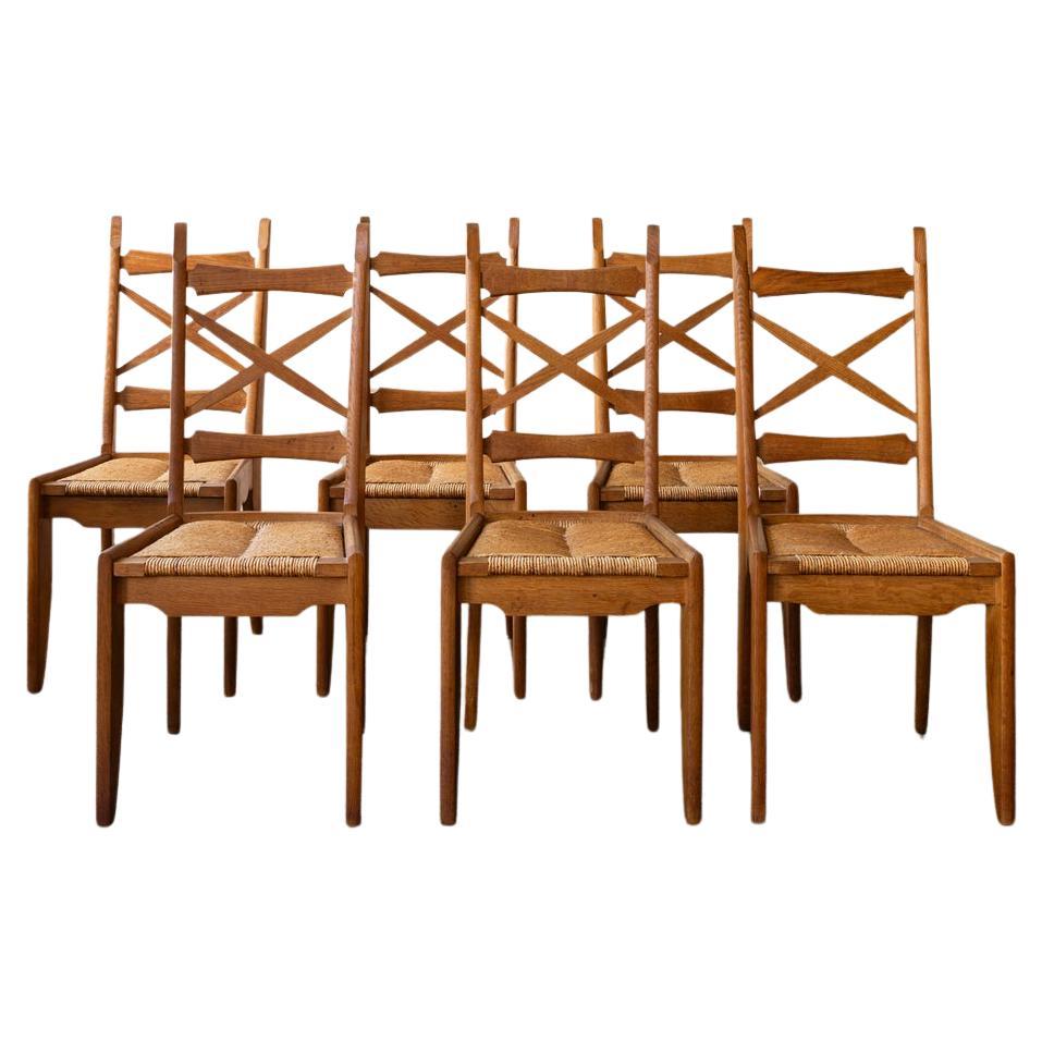 Set of Six Guillerme 
Chambron Dining Chairs in Oak and Rush, 1950s