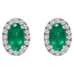 10K Weißgold 5x3 MM Oval Grüner Smaragd und Diamant Halo-Ohrstecker