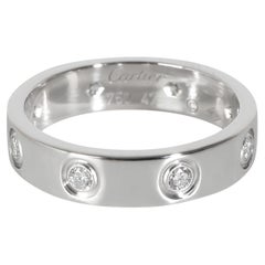 Bague Love en or blanc à diamants et petit modèle de Cartier