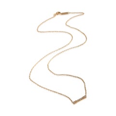 Tiffany & Co. Pendentif en or rose avec fleur de lys et diamants