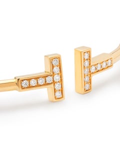 Tiffany & Co T yellow gold and diamond bangle
