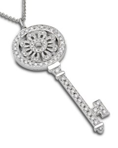 Tiffany white gold diamond large petal key pendant and chain.