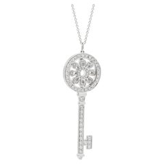 Tiffany white gold diamond large petal key pendant and chain.