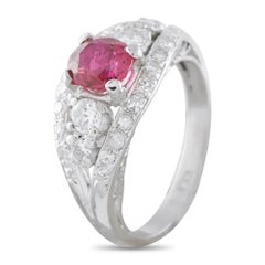 Anello in platino con diamante da 0,60 ct e rubino MF17-072826