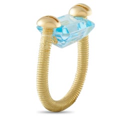 Anillo de topacio en oro amarillo de 18 quilates MF05-082526