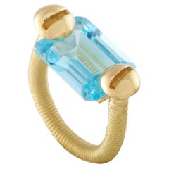 Anillo de topacio en oro amarillo de 18 quilates MF05-082526