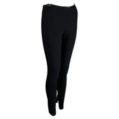 A/I 1997 Gucci by Tom Ford: pantaloni elasticizzati con fibbia quadrata nera.