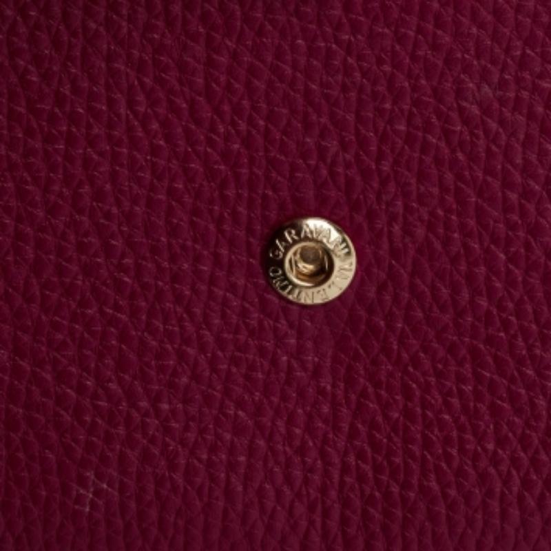 Valentino Cartera sobre Rockstud de piel rosa con cadena en venta 2
