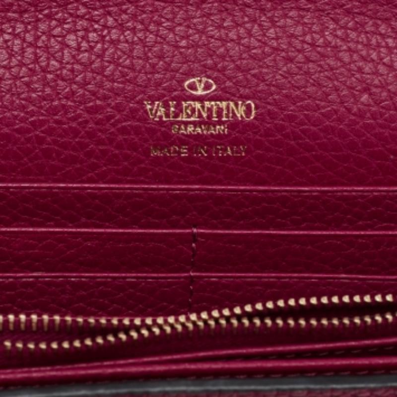 Valentino Cartera sobre Rockstud de piel rosa con cadena en venta 5