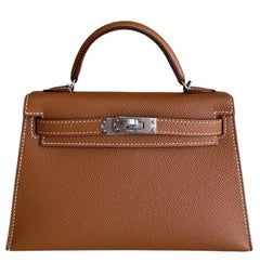 Borse Hermes Kelly Mini 20 in pelle Epsom color oro-beige con dettagli in palladio e manico superiore