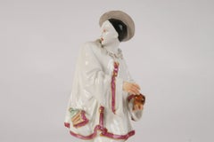 Statuetta in porcellana "Arlecchino", Francia, opera di Samson, fine del XIX secolo