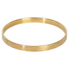 Tiffany & Co. Yellow Gold Notes Bangle Bracelet
