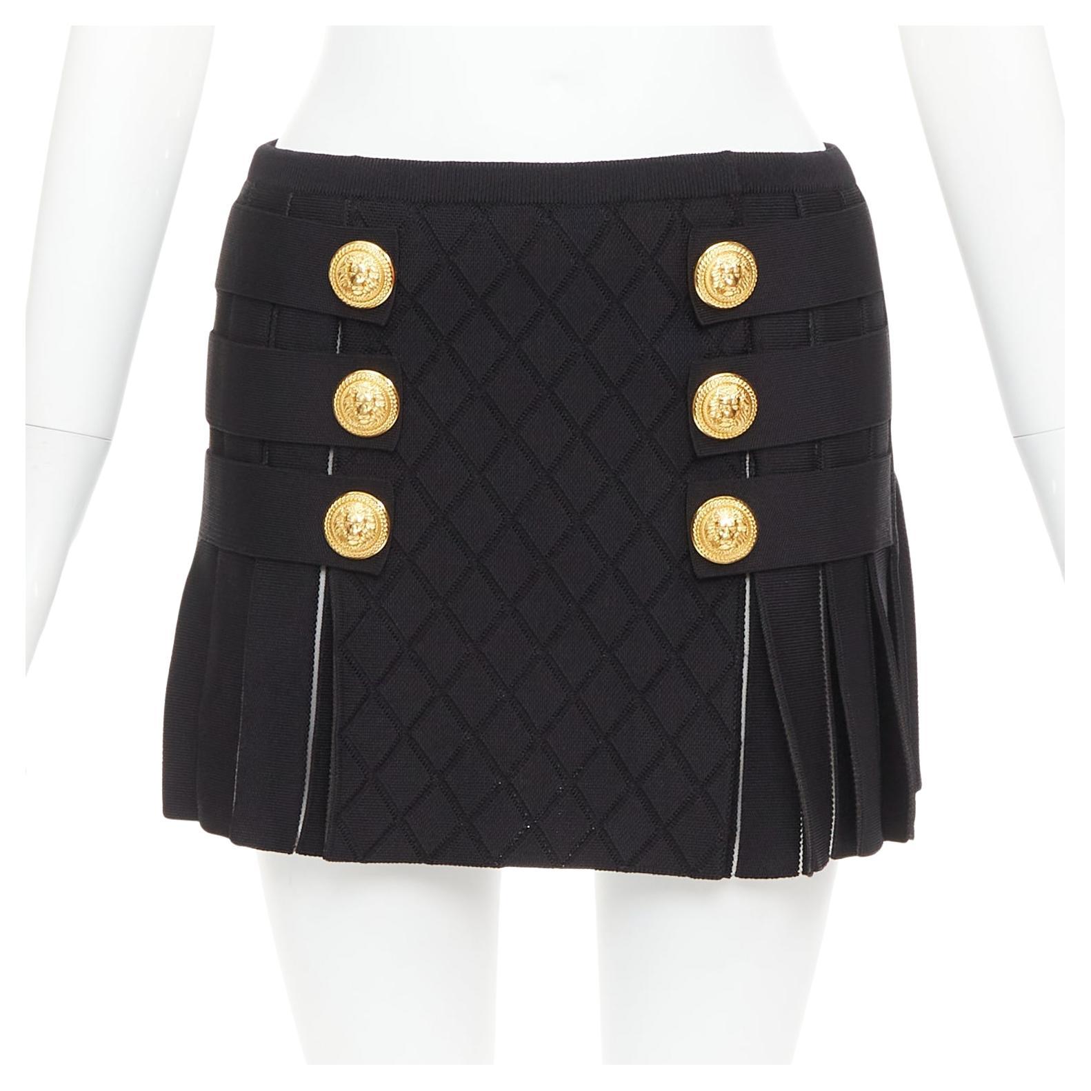 Balmain, minigonna plissettata in maglia a rombi con bottoni dorati neri FR34 XS