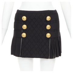 BALMAIN black gold lion buttons diamond grid knit pleated mini skirt FR34 XS