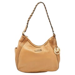Michael Kors Hobo aus braunem Leder mit geflochtenem Griff