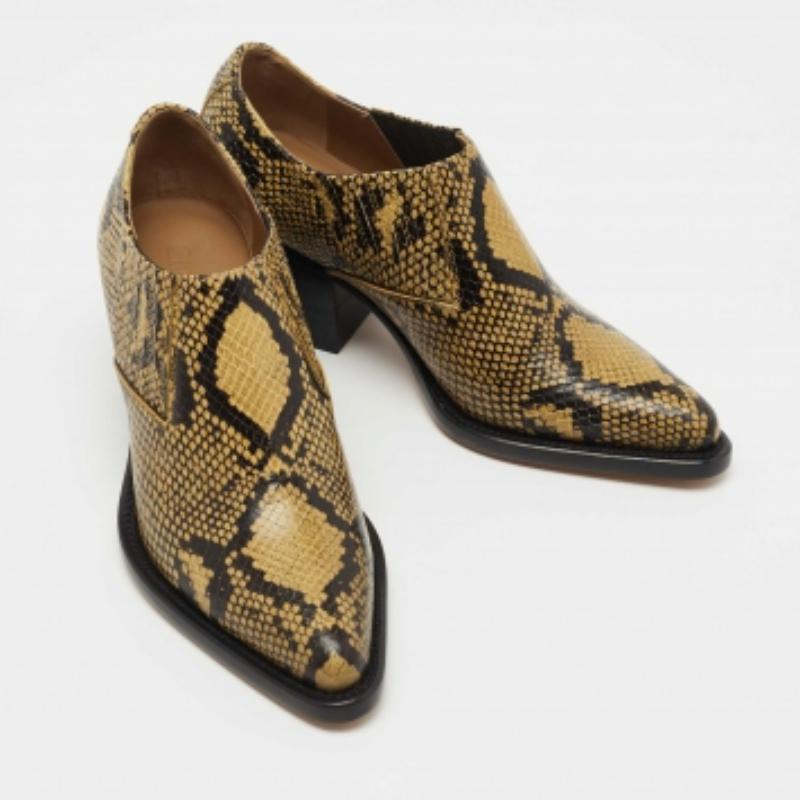 Nero Chloe - Stivaletti Rylee in pelle goffrata di pitone giallo/nero - misura 37 in vendita