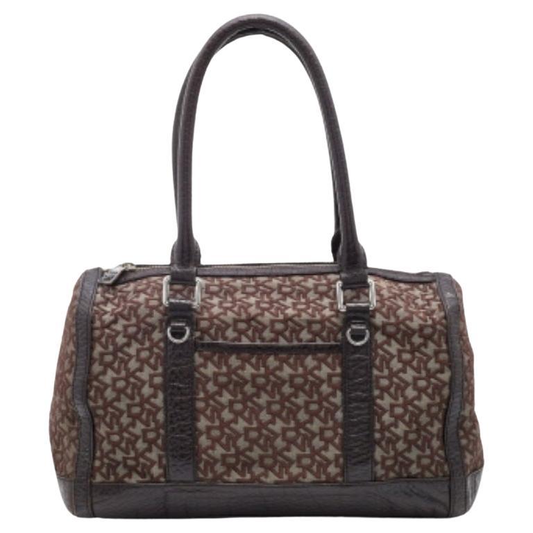 DKNY, la borsa in tela e pelle marrone scuro firmata da DKNY in vendita