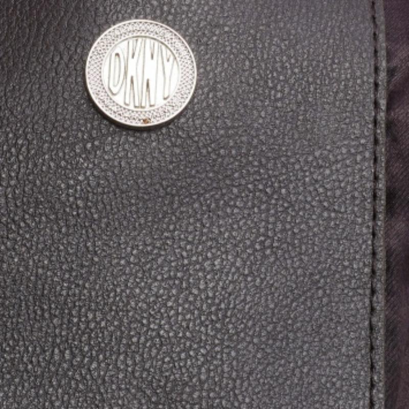 Donna DKNY, la borsa in tela e pelle marrone scuro firmata da DKNY in vendita
