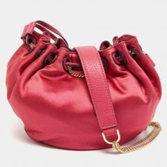 Diane von Furstenberg Mini bolso de mano con cordón Love Power de satén magenta