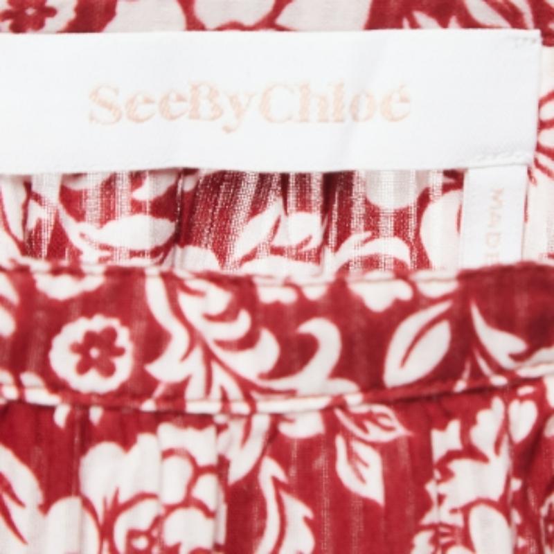 See By Chloe - Minigonna in cotone con stampa floreale e rifiniture in pizzo, colore rosso S In condizioni buone in vendita a Dubai, Al Qouz 2