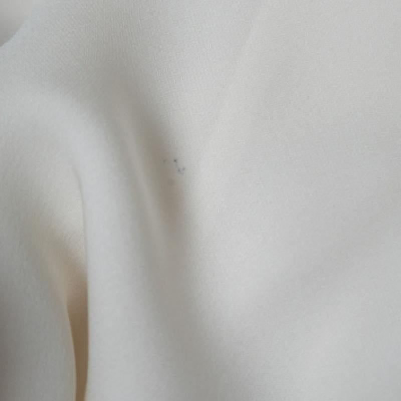 Diane von Furstenberg Top de seda crema sin mangas con dobladillo de volantes S en Bueno estado para la venta en Dubai, Al Qouz 2