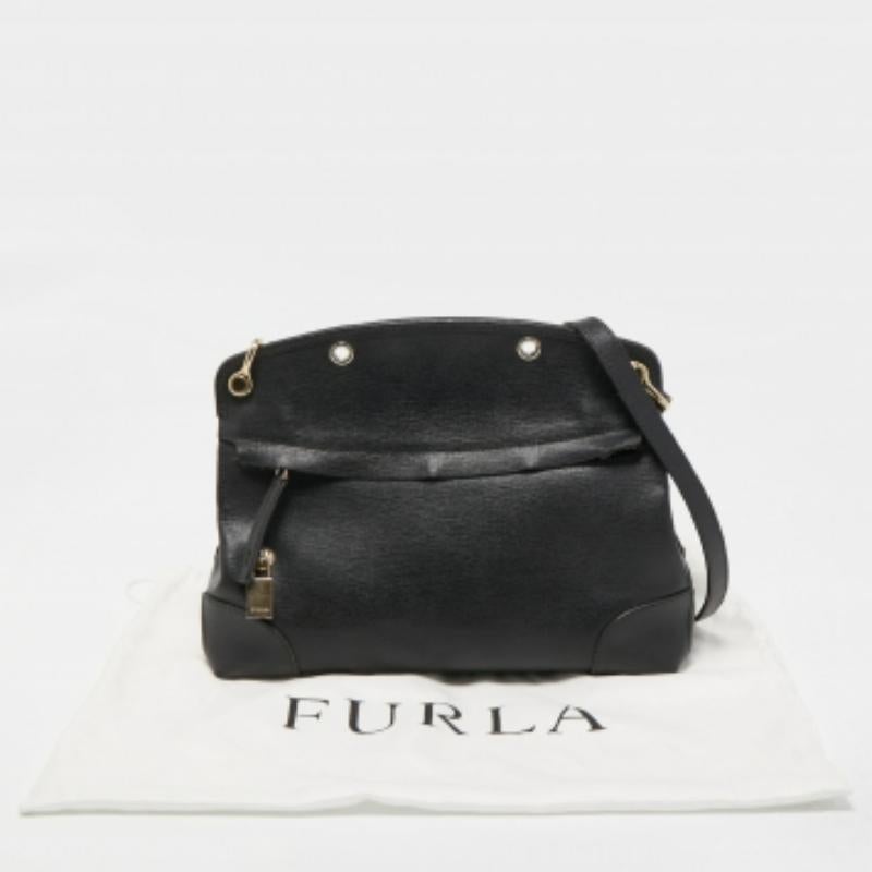 Furla Cartera Piper de piel negra en Bastante bueno estado para la venta en Dubai, Al Qouz 2