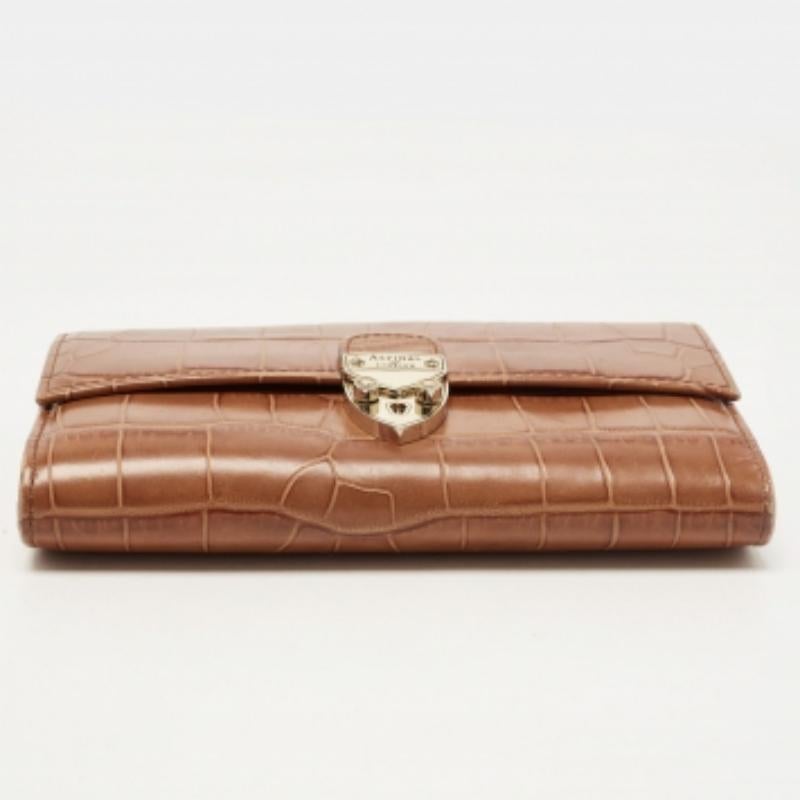 Donna Aspinal of London Portafoglio continentale Mayfair in pelle marrone goffrata a coccodrillo in vendita