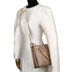Louis Vuitton Lambskin Embossed Monogram Coussin PM Taupe