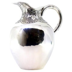 Rounded silver water jug
