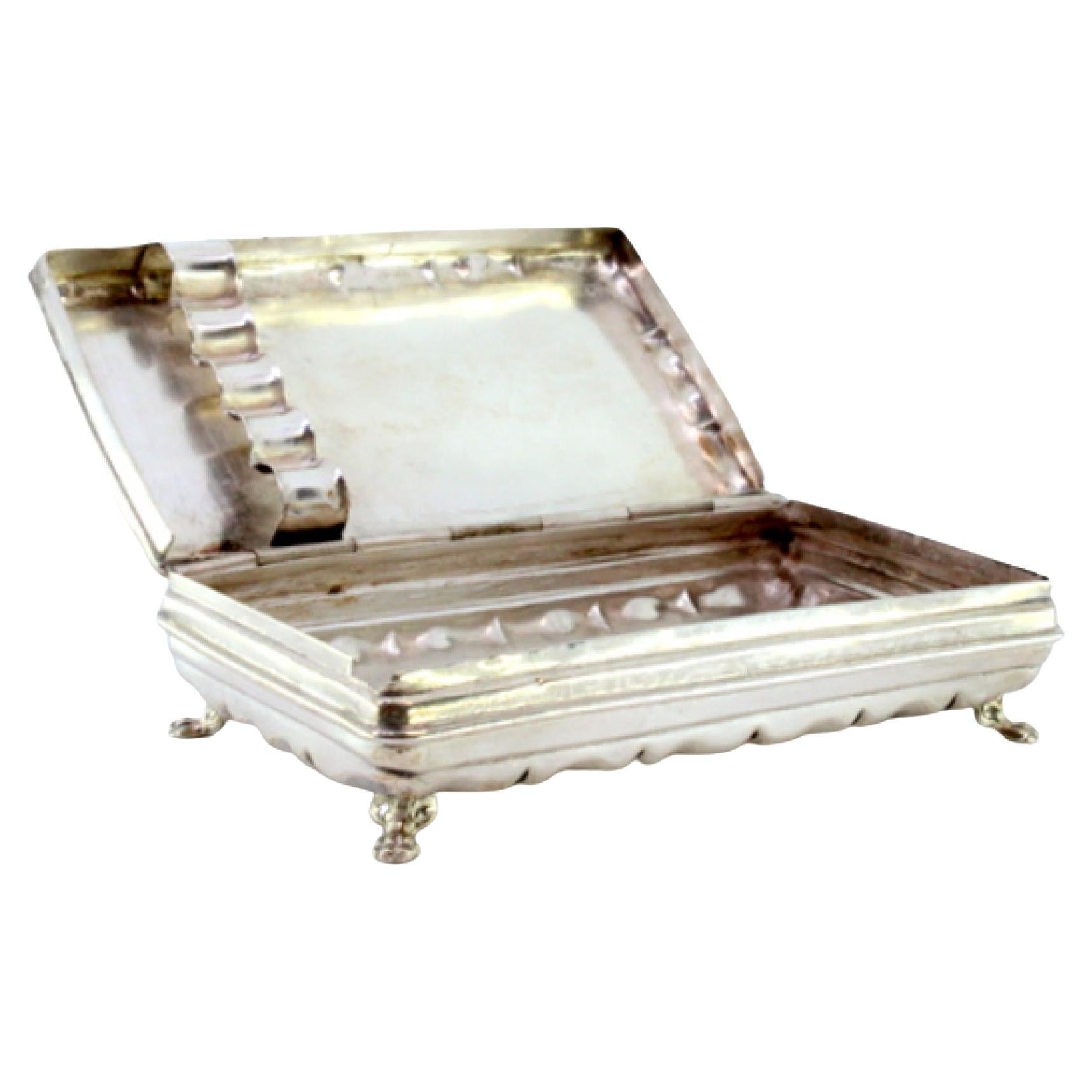 Silver snuffbox with cigarette holders & monogram on claw feet