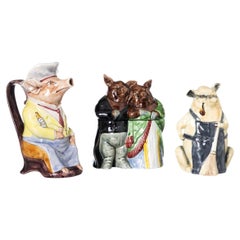 Earthenware - Two jugs and a 'pig' shaped box in earthenware