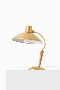 Lampe de table moderne de style scandinave en laiton et bois, années 1940