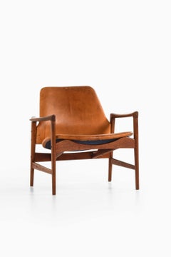 Fauteuil « Holte » de style moderne scandinave, en teck et cuir, par Ib Kofod-Larsen, années 1950