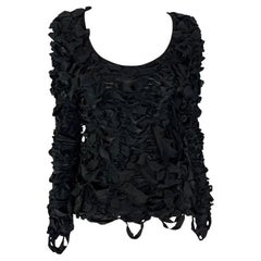 Pull en tricot à rubans noirs Yves Saint Laurent par Tom Ford, A/H 2001