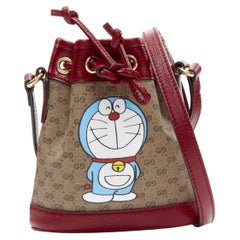 GUCCI DORAEMON 2021 Limited GG Supreme red drawstring crossbody bucket bag
