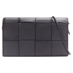 BOTTEGA VENETA Cassette black maxi woven intrecciato leather crossbody mini bag