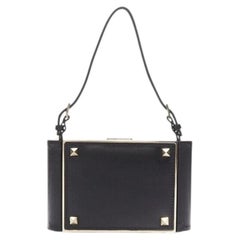 VALENTINO black leather gold rockstud metal frame miniaudiere clasp clutch bag