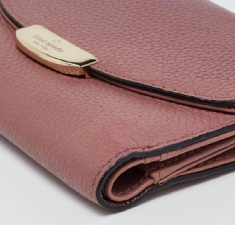 Donna Portafoglio compatto trifold in pelle rosa di Kate Spade in vendita