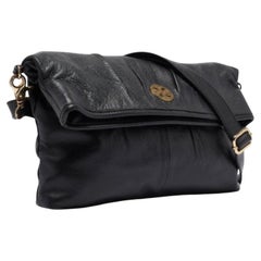 Tory Burch Schwarze gefaltete Umhängetasche aus Leder