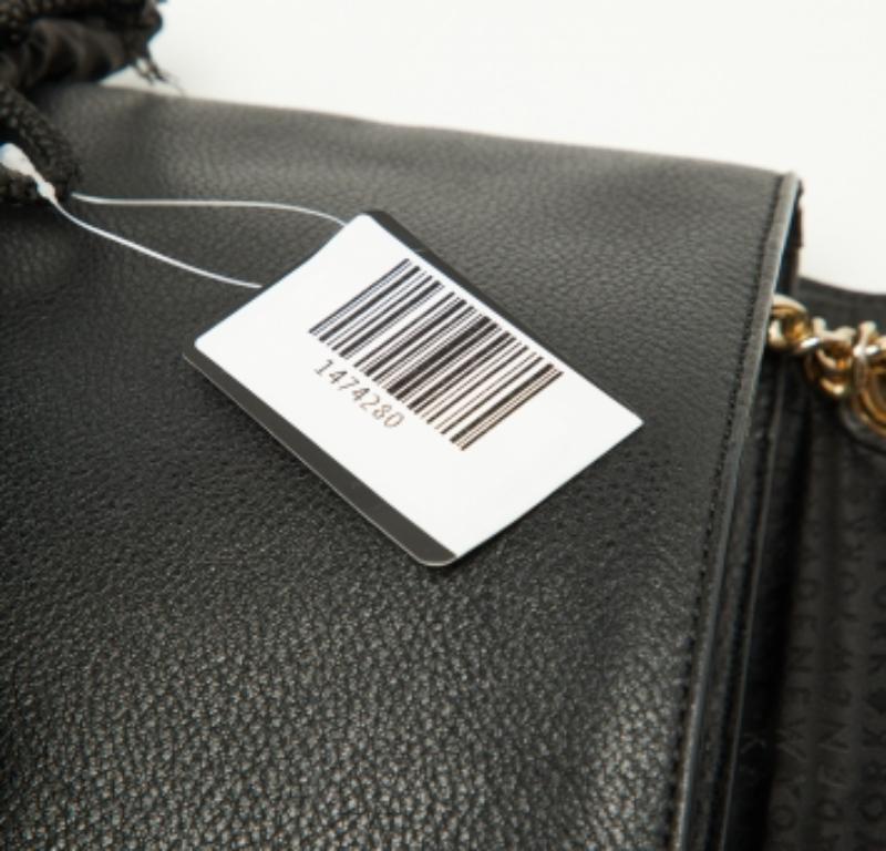 Donna Kate Spade - Borsa a tracolla con patta in pelle nera e serpente in vendita